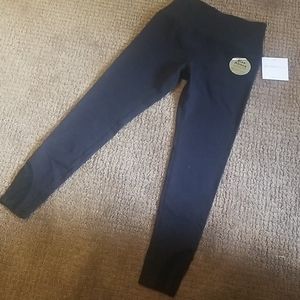 NWT Beyond Yoga "Rise Above" black leggings